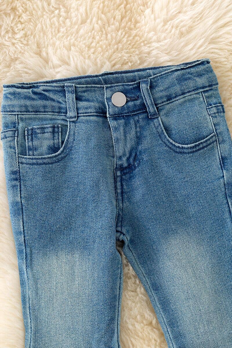 Lt. Blue denim pants with front bow opening.