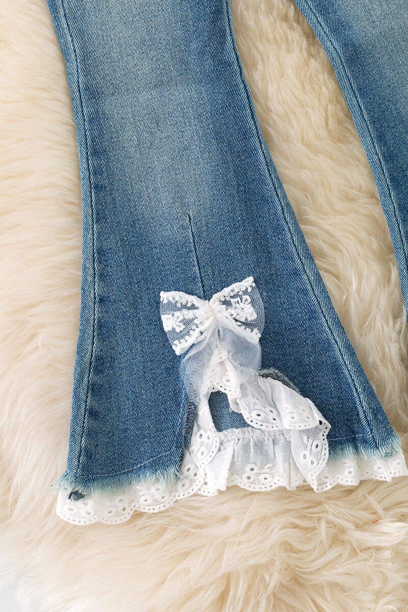 Lt. Blue denim pants with front bow opening.