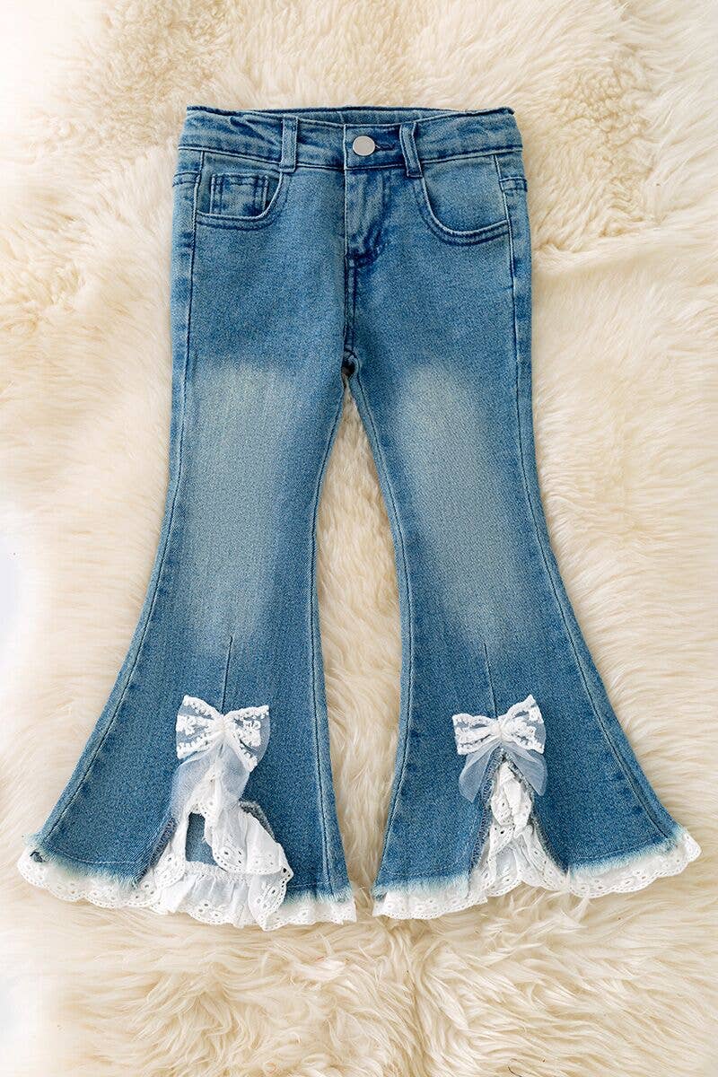 Lt. Blue denim pants with front bow opening.