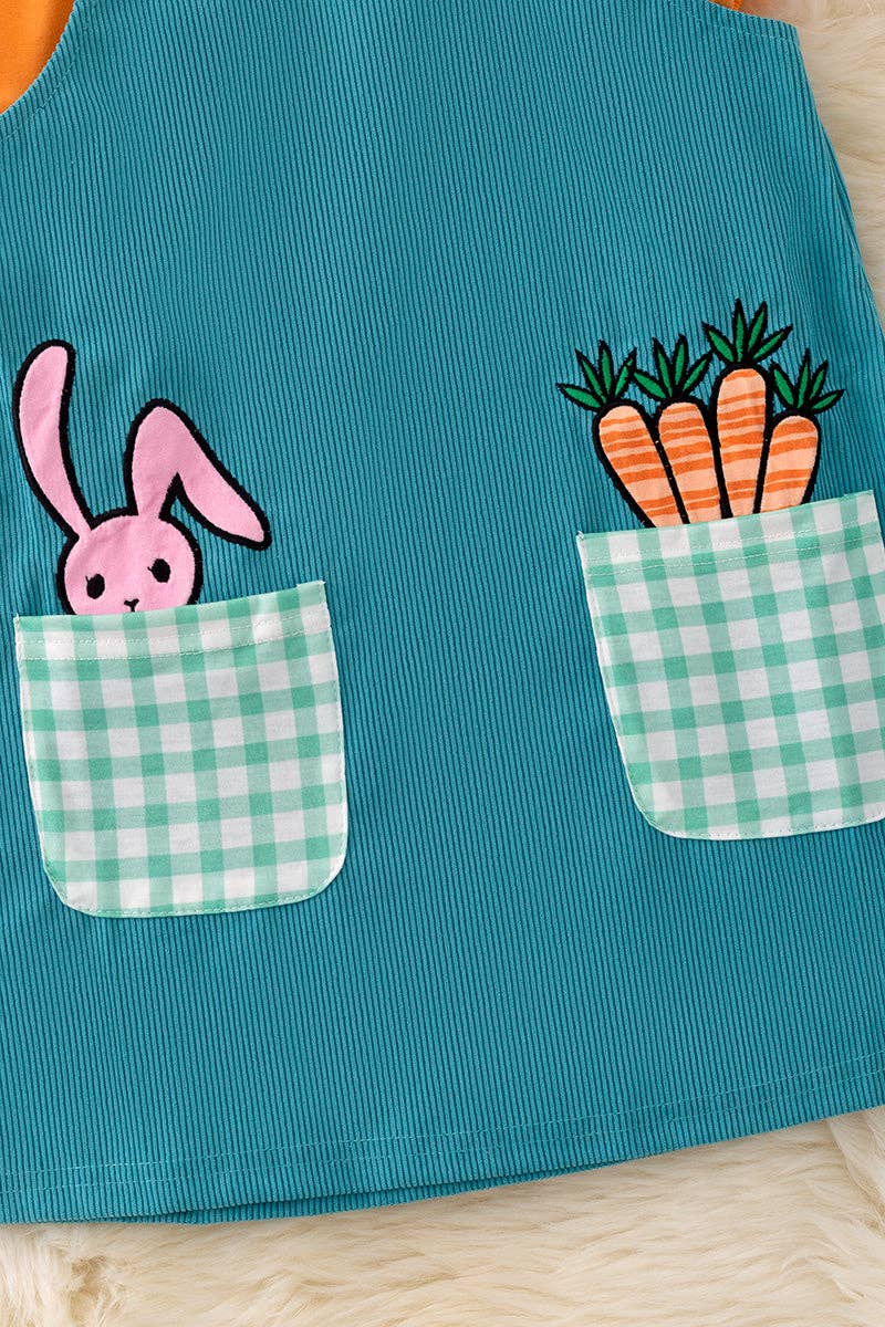 Teal Easter overall dress with orange bubble shirt.